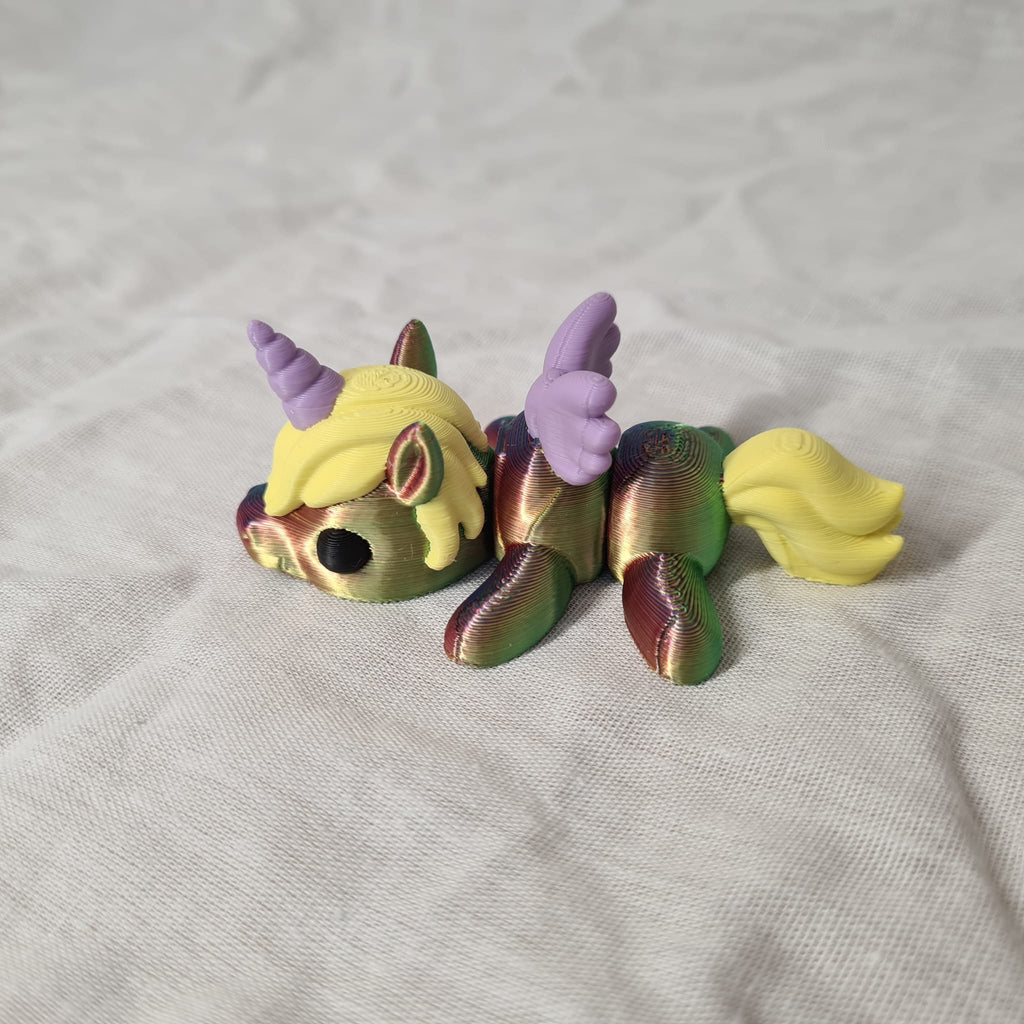 Liegendes Regenbogen Einhorn 🦄