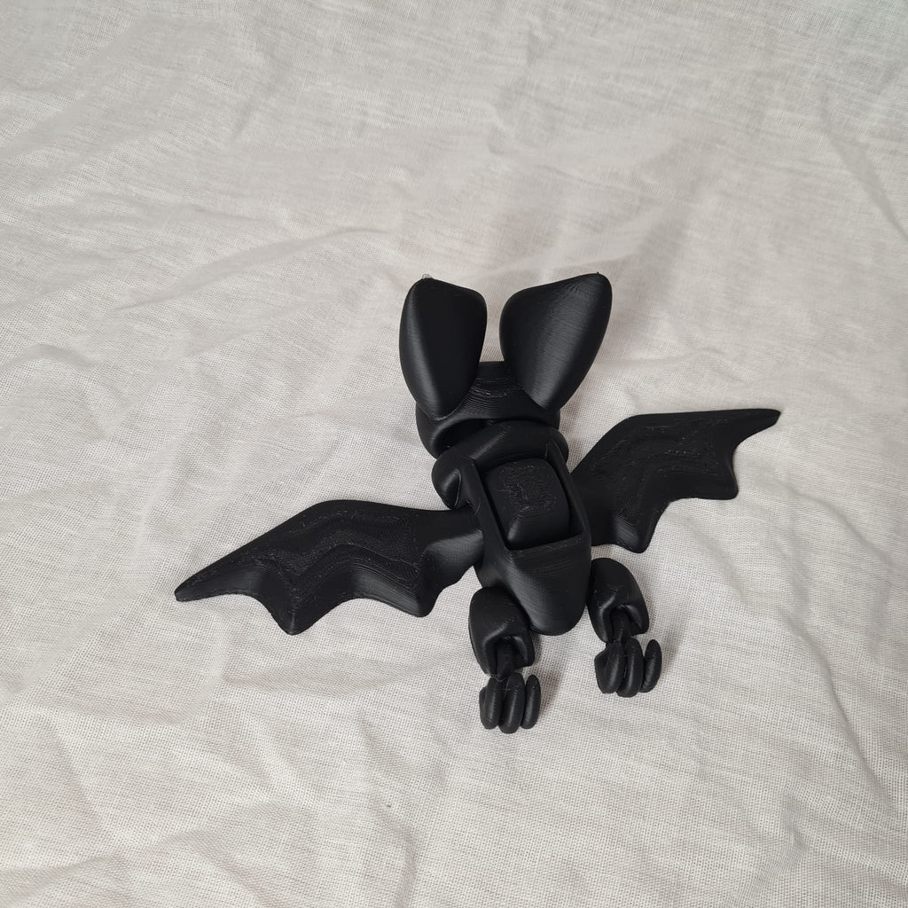 🦇 Bewegliche Fidget-Fledermaus – Flügelschlag per Knopfdruck